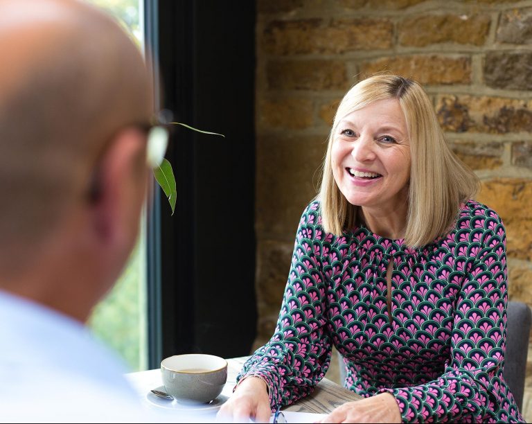 Fiona listening to a client