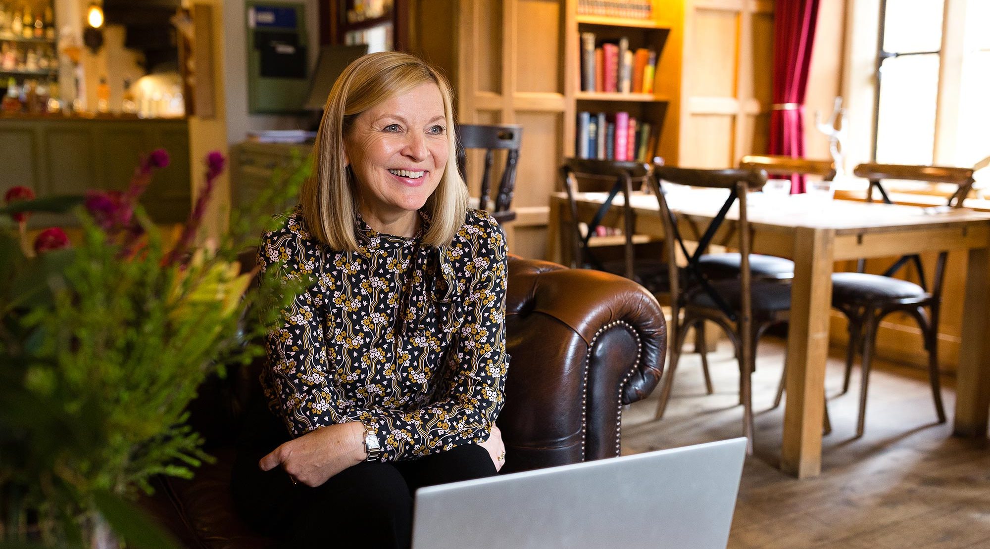 Fiona Legros working on a laptop